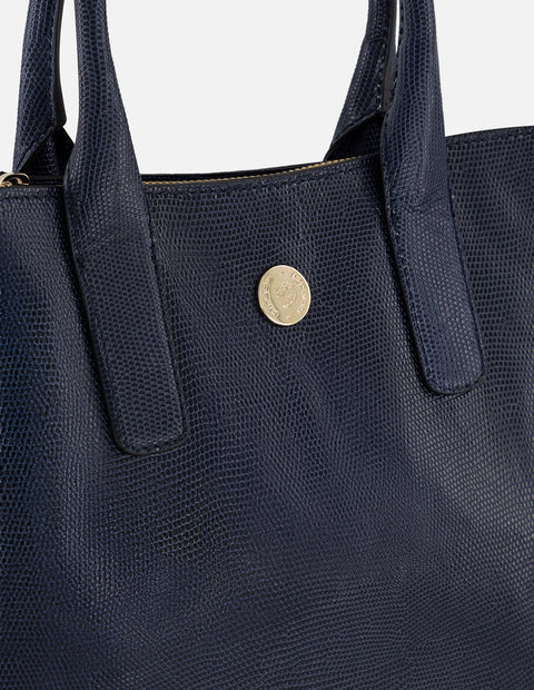 Satchel azul piel tipo tejus para mujer con acabado brillante