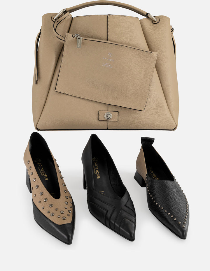 Zapatilla negra piel de mujer cortes simétricos