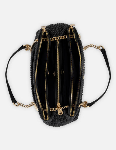 Bandolera negra piel vegana para mujer con capitonado