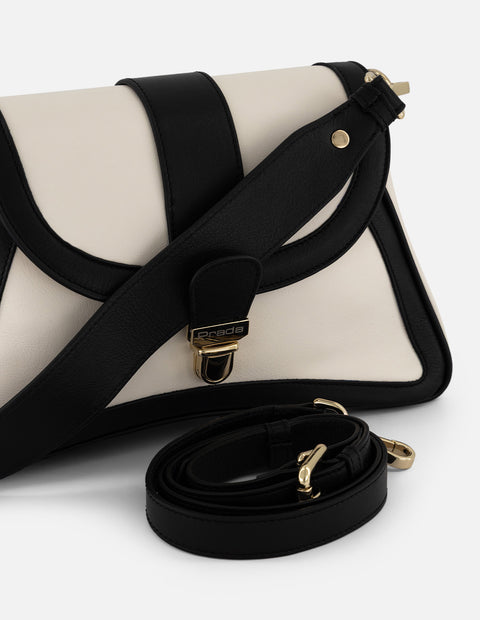 Bolso satchel asimétrico color blanco para mujer con herrajes dorados