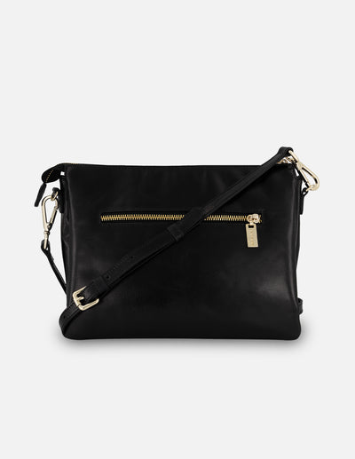 Bandolera negra en piel con costuras cruzadas para mujer