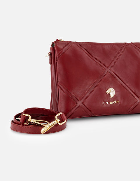 Bandolera roja en piel para mujer con costuras cruzadas