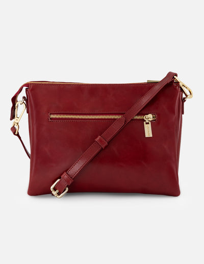 Bandolera roja en piel para mujer con costuras cruzadas