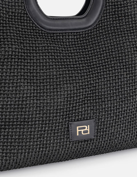Bolso de mano negro en rafia con combinación de materiales