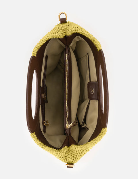 Bolso de mano verde en rafia con combinación de materiales