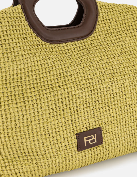 Bolso de mano verde en rafia con combinación de materiales