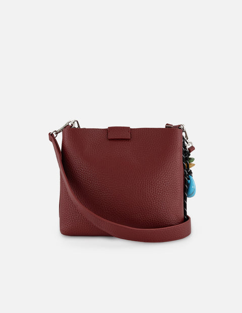 Bolso de hombro rojo en piel vegana con grabado
