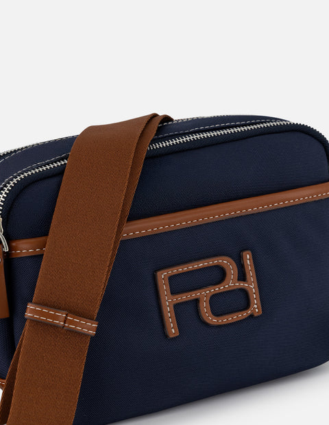 Bandolera azul en nylon con pespuntes en contraste