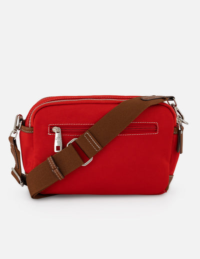Bandolera roja en nylon con aplicaciones en contraste