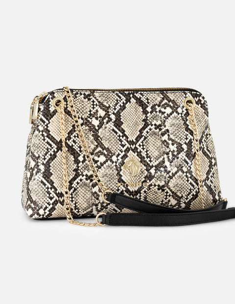 Bandolera blanca tipo serpiente con cadena doble y detalle metálico para mujer