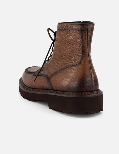 Botines cuero piel bombeada para hombre con detalle