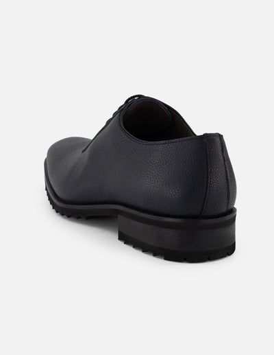 Zapato Oxford azul piel para hombre con corte asimétrico