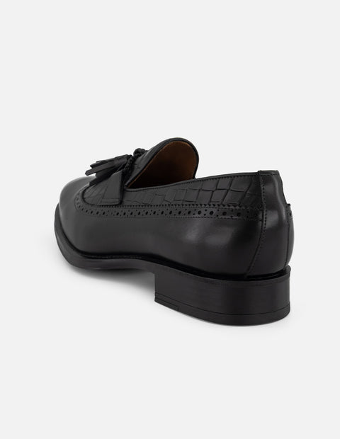 Mocasines negros piel tipo coco para hombre con borlas