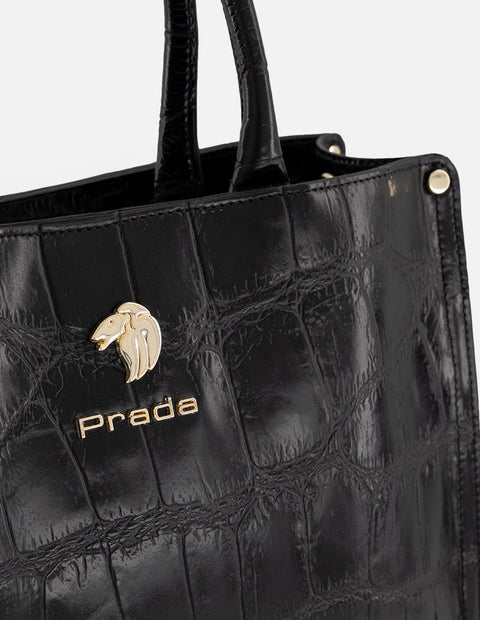 Bolso de mano negro piel tipo coco para mujer con logo frontal