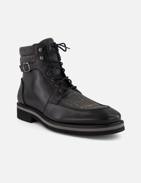 Botines negros piel y textil para hombre con hebilla lateral