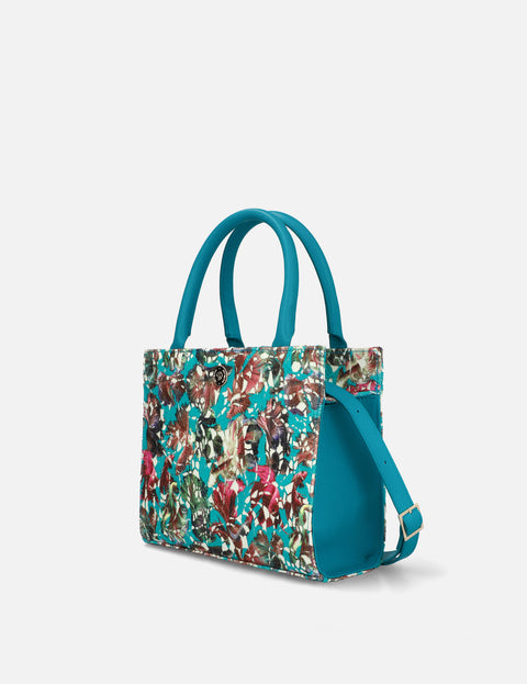 Bolso de mano en piel forrado con textil floral