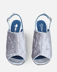 Botín con abertura en textil oro con tacón de joya para mujer