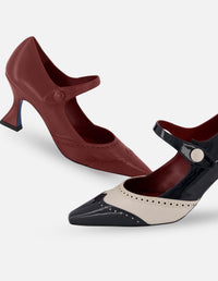 Zapatilla tipo salón de tacón medio con picado en punta de piel charol para mujer.