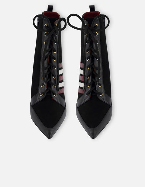 Botín tacón en ante y piel para mujer.