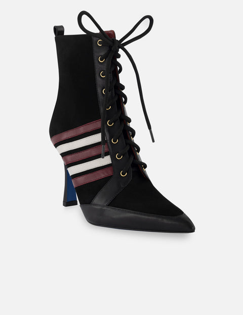 Botín tacón en ante y piel para mujer.