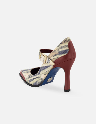 Zapatilla tipo salón de pelo con detalles color rojo para mujer