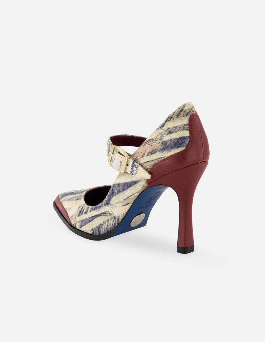 Zapatilla tipo salón de pelo con detalles color rojo para mujer