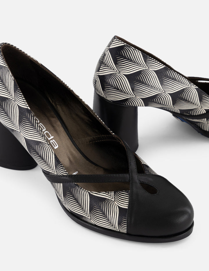 Zapatilla blanca en piel para mujer con patrón geométrico