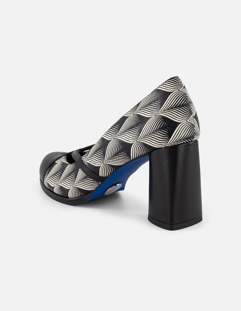 Zapatilla blanca en piel para mujer con patrón geométrico