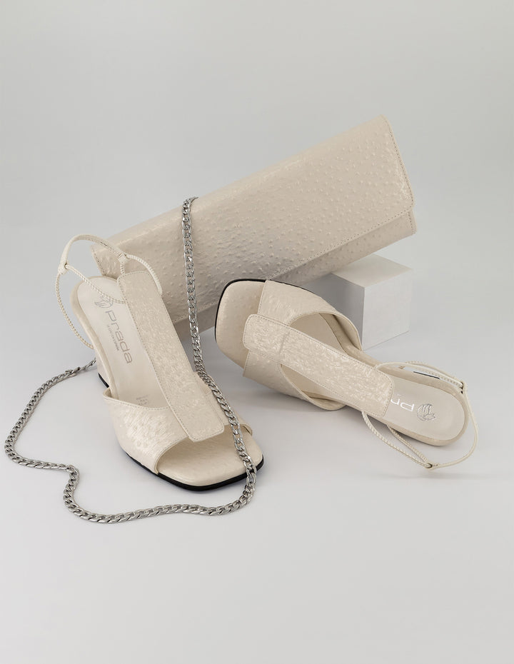 Sandalias blanco piel grabada para mujer con acabado troquelado