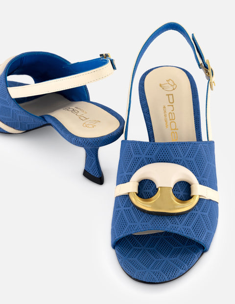 Mule azul en piel grabada con adorno circular bicolor para mujer