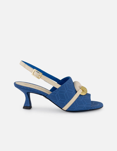Mule azul en piel grabada con adorno circular bicolor para mujer