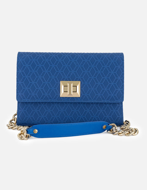 Satchel azul en piel grabada con diseño geométrico para mujer