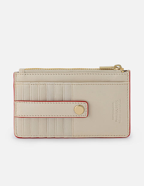 Monedero para mujer con detalles rojos y cierre superior