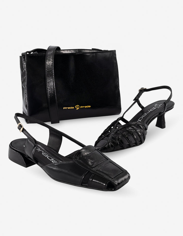 Flat destalonado de charol en color negro para mujer