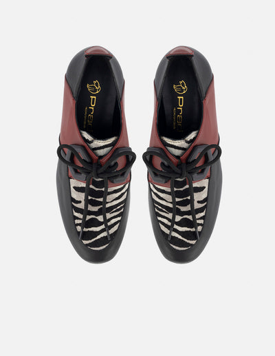 Blucher en piel napa en bloques de color para mujer con detalle en animal print