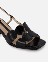 Sandalia de piel charol color negro para mujer con detalles en círculo