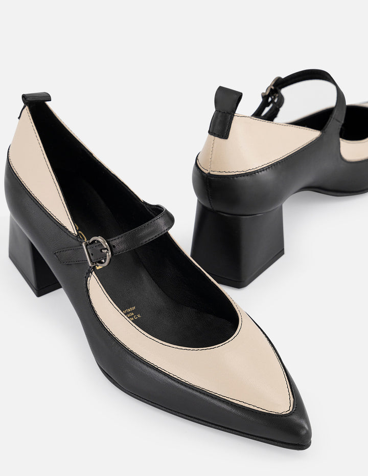 Mercedes bicolor piel de mujer con pulsera negra