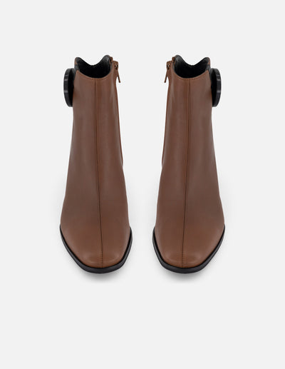 Botines color cuero piel de mujer con adorno en forma de círculo
