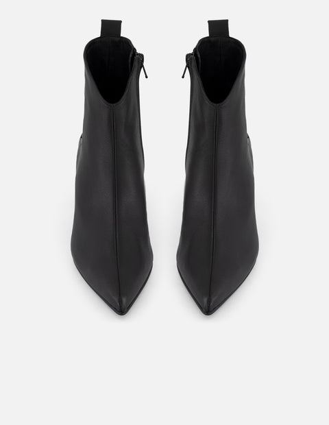 Botines color negro piel de mujer con adorno de estrella
