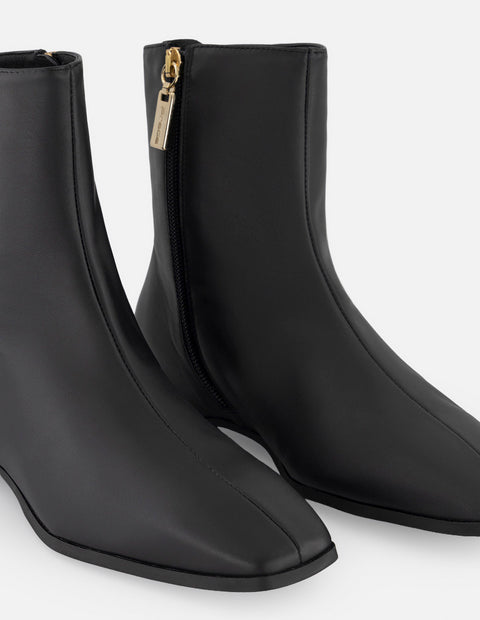 Botines negro piel para mujer con cierre lateral visible