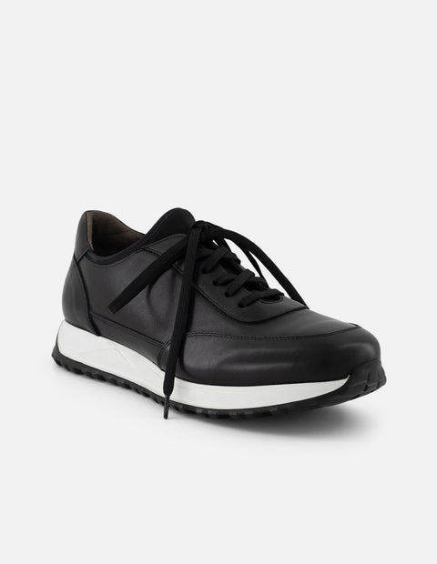 Tenis negro piel para hombre con combinación de materiales