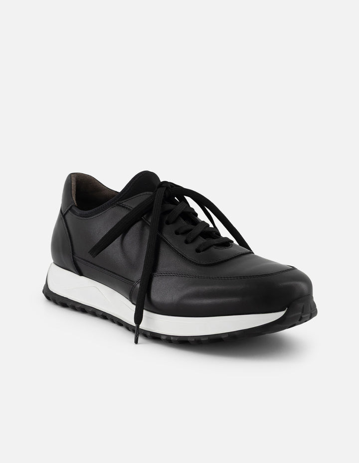 Tenis negro piel para hombre con combinación de materiales