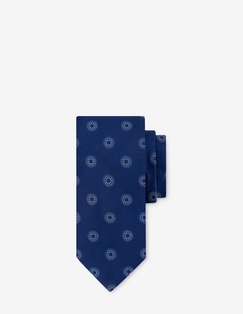 Corbata textil color azul con estampado de círculos en contraste