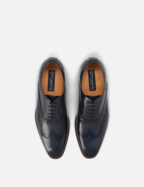 Oxford en piel con picado color marino