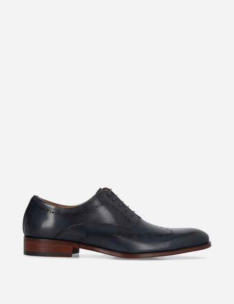 Oxford en piel con picado color marino