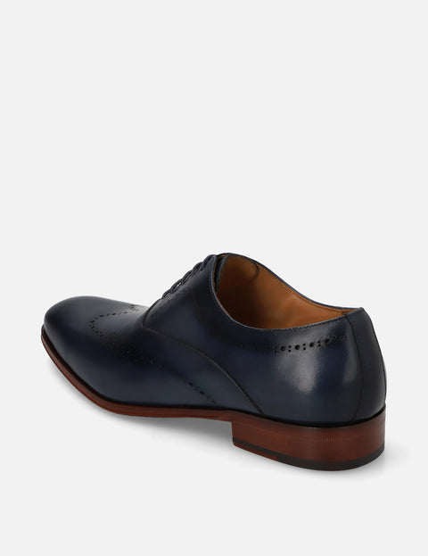 Oxford en piel con picado color marino