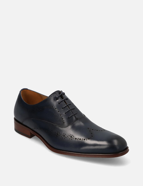 Oxford en piel con picado color marino