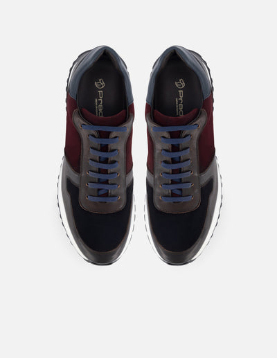 Deportivo en piel color azul con detalles en ante y suela extra light para hombre