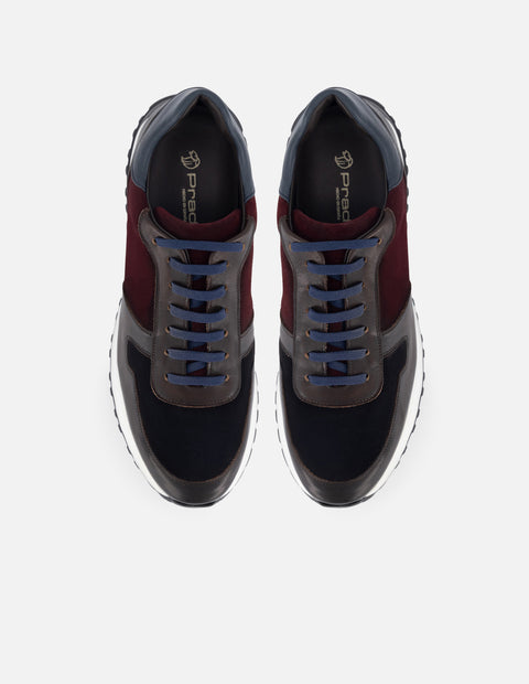 Deportivo en piel color azul con detalles en ante y suela extra light para hombre