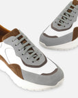 Tenis en piel napa color blanco con aplicaciones de ante para hombre